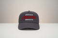 The Cap Shack charcoal grey 5-panel cotton cap with embroidered "FULLY CERTIFIED MENACE." in red and white. Pre-curved peak.